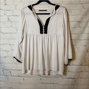 Zara Black and White Peplum Long Sleeve blouse